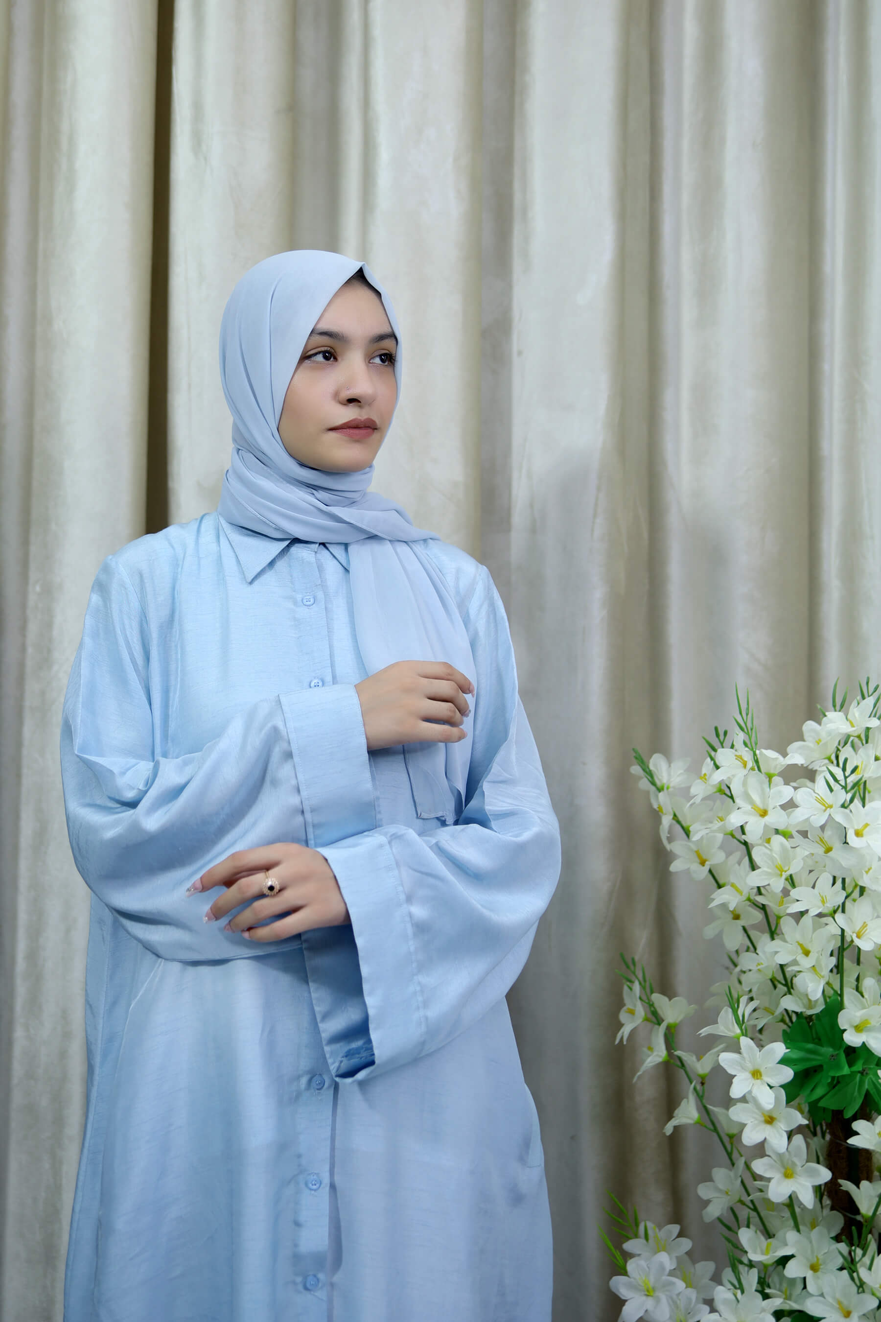 Shehnaz - Light Blue Button-Down Abaya with Pockets – Everyday Elegance