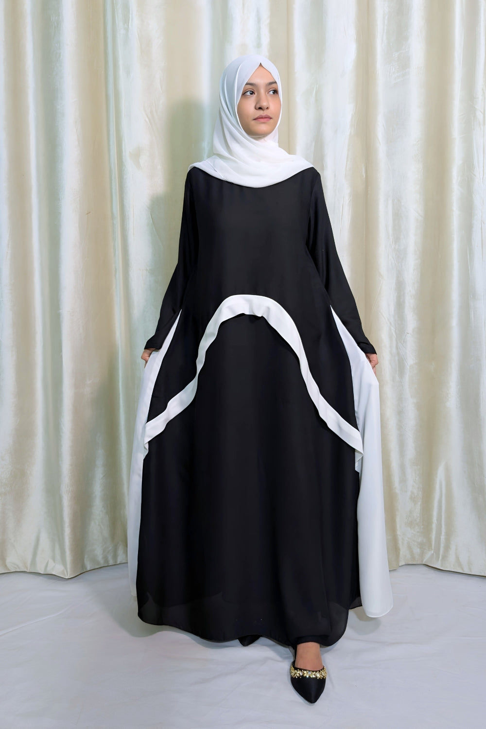 Elegant Black Butterfly Abaya with White Draped Detail – Modest & Flowing Design