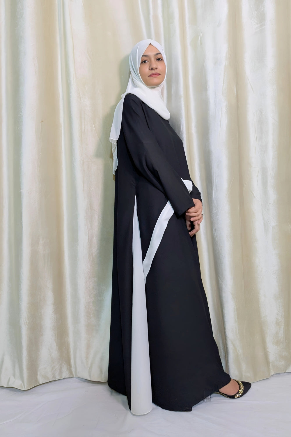 Elegant Black Butterfly Abaya with White Draped Detail – Modest & Flowing Design