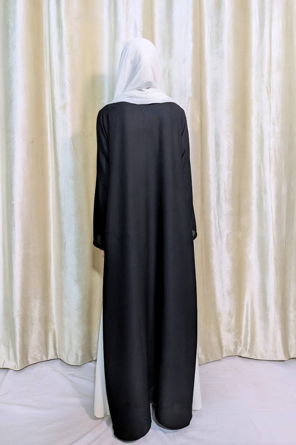 Elegant Black Butterfly Abaya with White Draped Detail – Modest & Flowing Design