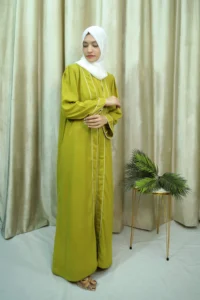 green-abaya-standing-full-length Hajarah - Elegant Green Open Abaya with White Piping – Modest Long Dress for Women