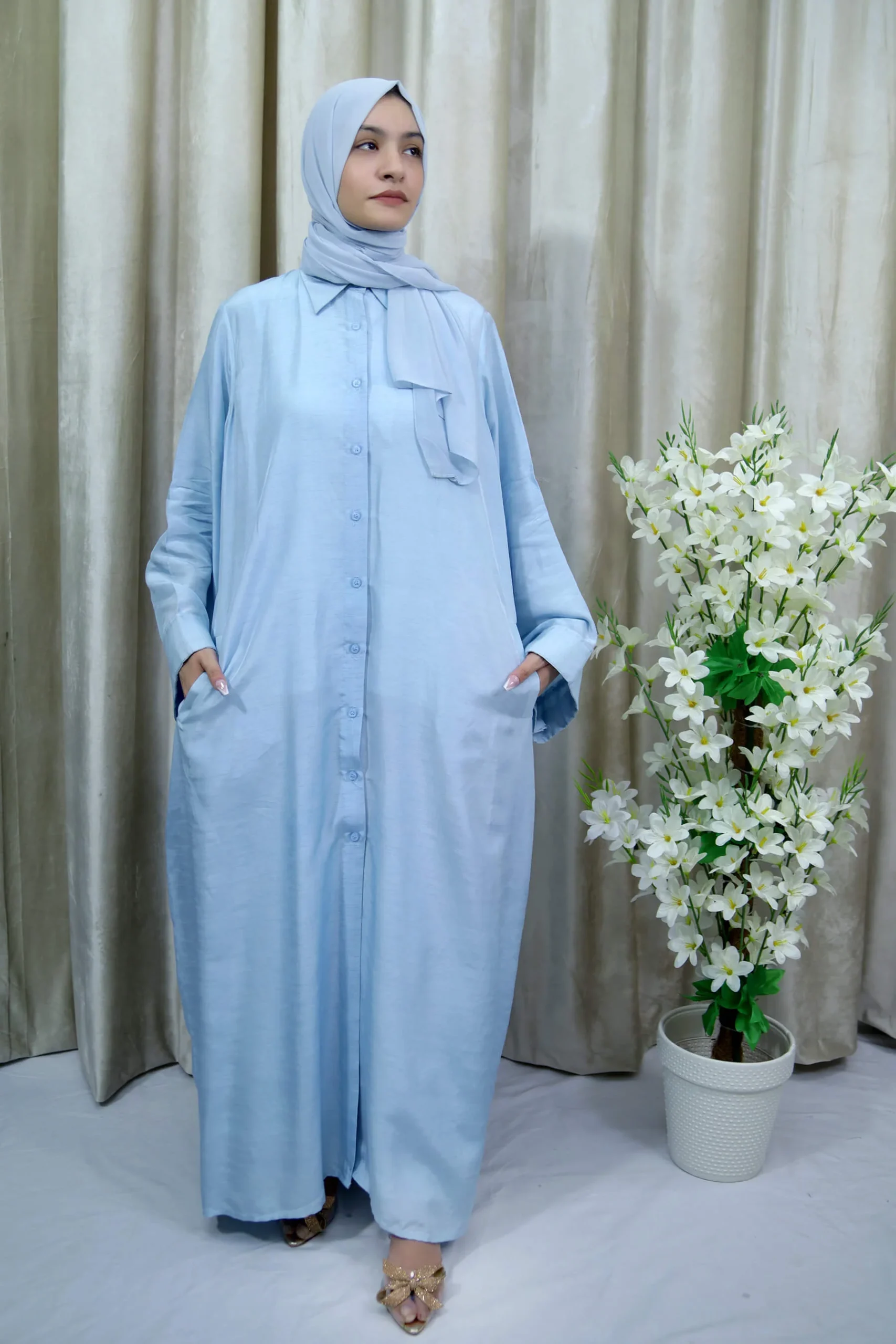 Shehnaz - Light Blue Button-Down Abaya with Pockets Everyday Elegance - Ayda Sumayah Shehnaz - Light Blue Button-Down Abaya with Pockets Everyday Elegance - Ayda Sumayah
